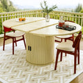 Mesa de comedor con tablero redondeado y base central - amarillo